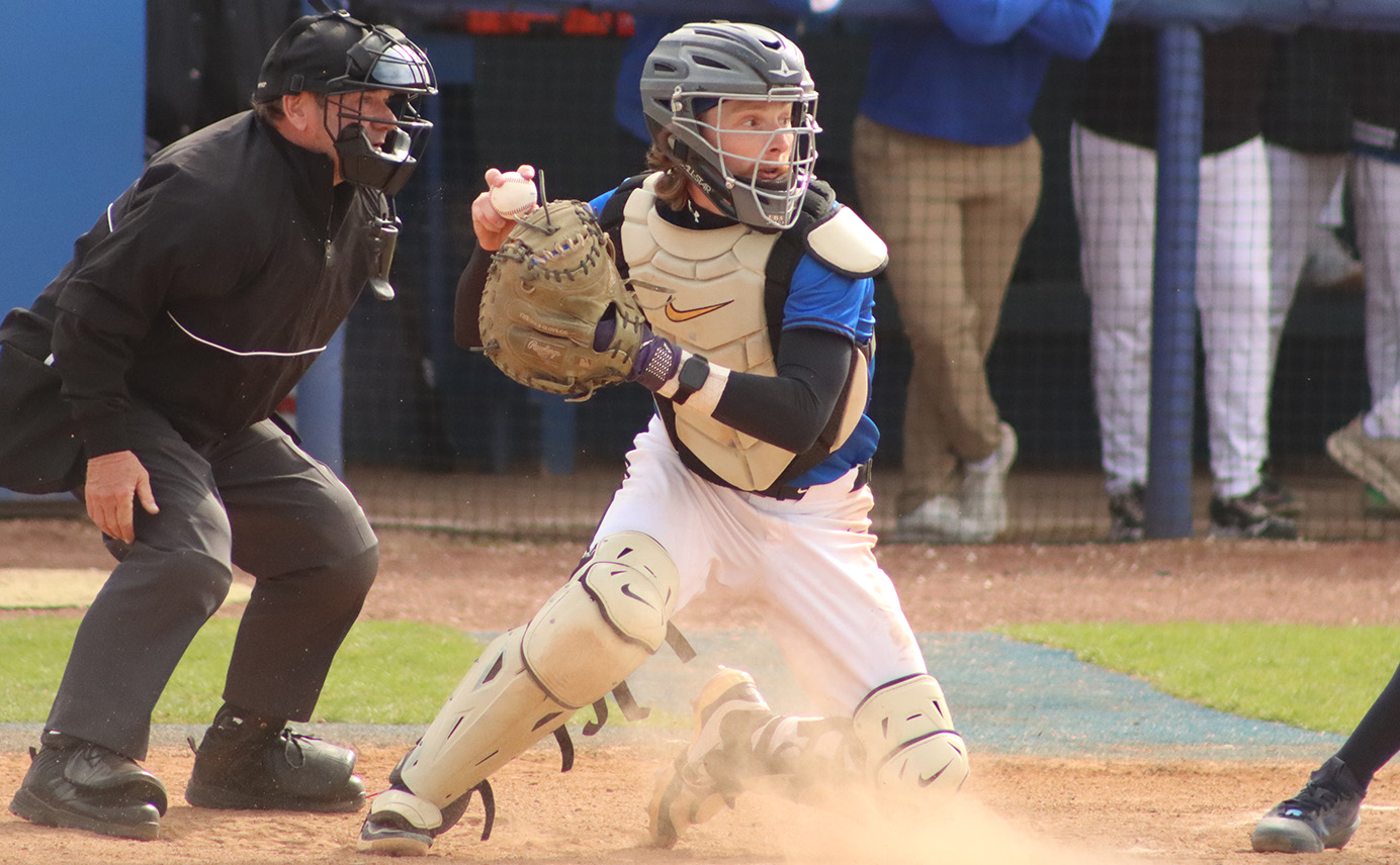 Clarke Hands Wildcats Two Losses in Makeup Twinbill